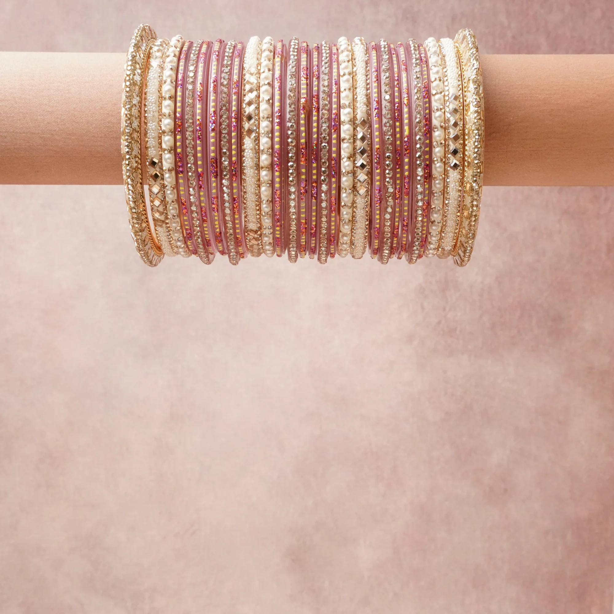 A grounding Mauve forms the heart of the set, while touches of Gold, White, Clear Crystal add charm.

A thoughtful composition of Glass, Metal Alloy, Faux Pearl, Rhinestone, Seed Bead, designed to feel complete without being heavy.
Each element layers seamlessly, creating a look that is refined, wearable and quietly striking.